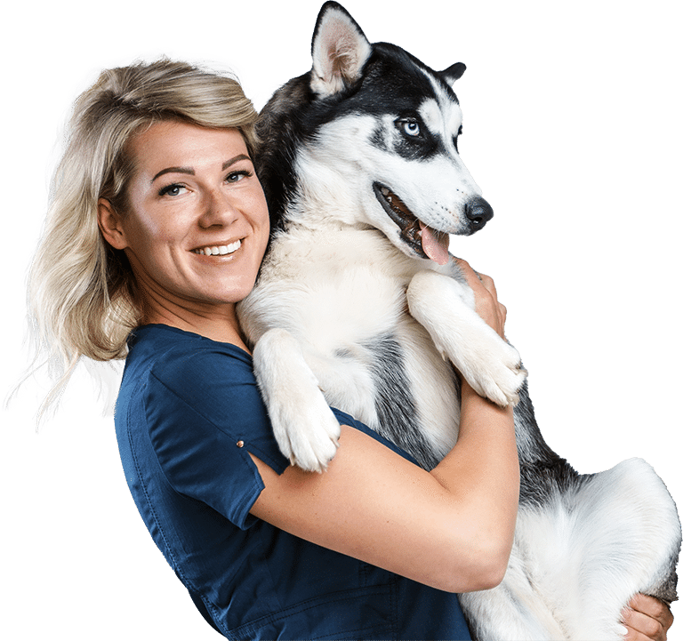 Happy woman holding happy dog